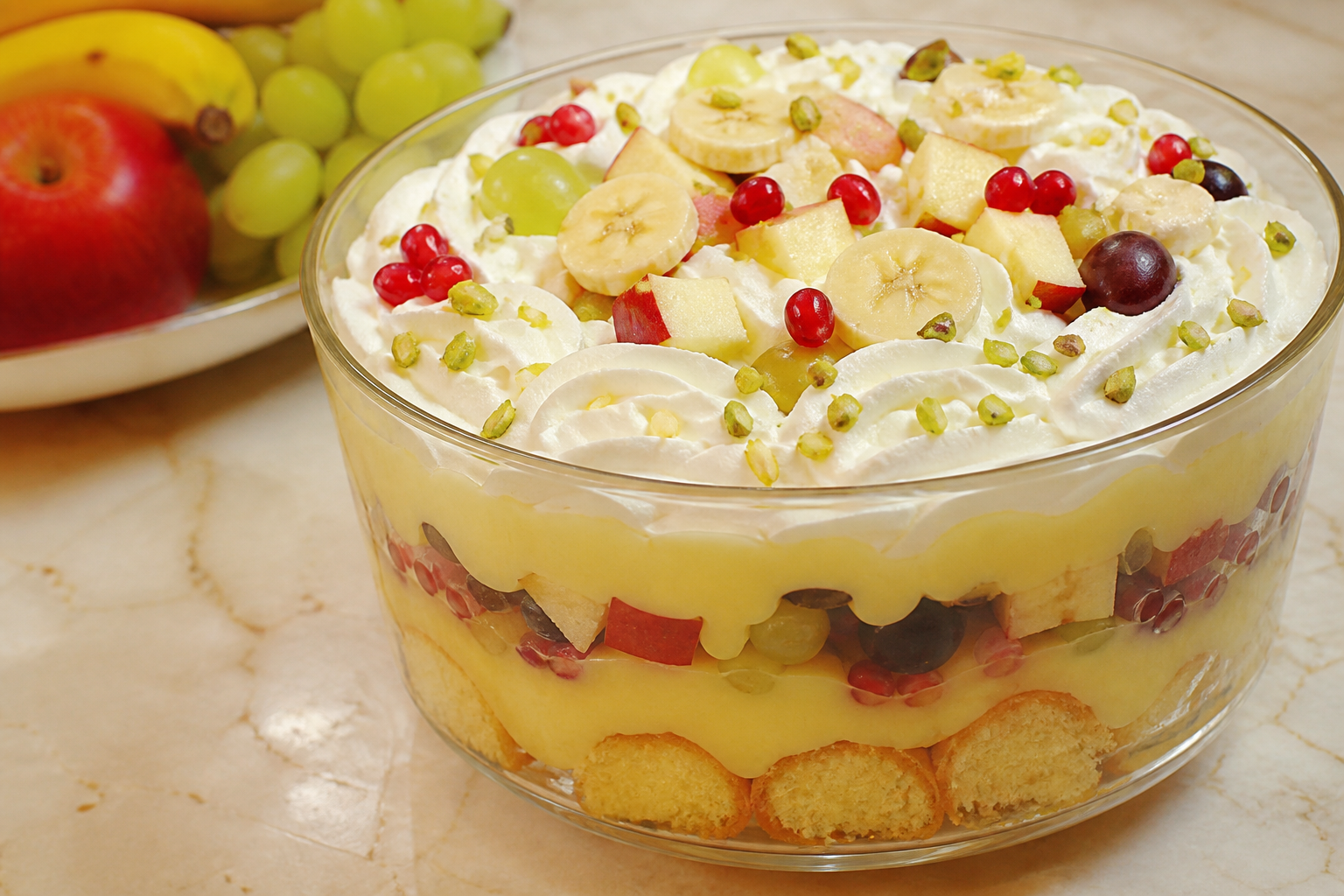Fruit trifle with custard and cream